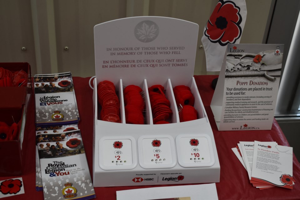 Guelph's first electronic poppy campaign donation box offers the option to tap debit or credit cards.