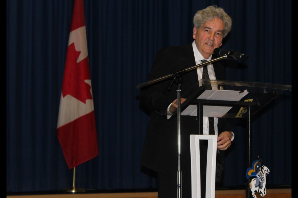 Joe Tersigni speaks to the crowd after accepting the 2022 National Leadership Award at Our Lady of Lourdes Catholic High School Friday.