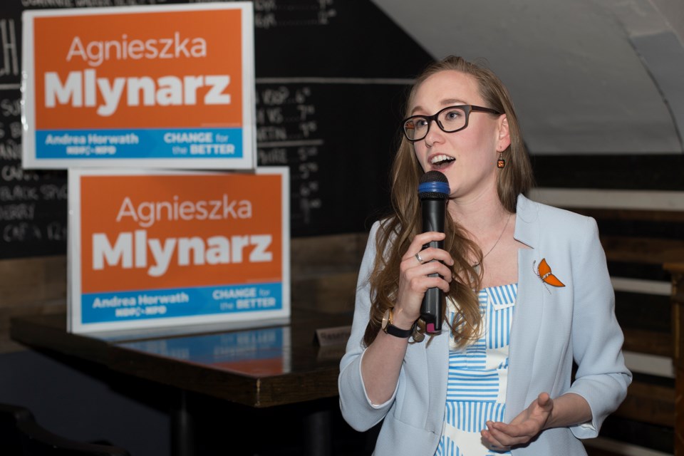 Aggie Mlynarz, Guelph NDP candidate, speaks to supporters at NV Kitchen + Bar on Thursday night, after the local riding had been called in favour of Green Party leader Mike Schreiner. Kenneth Armstorng/GuelphToday