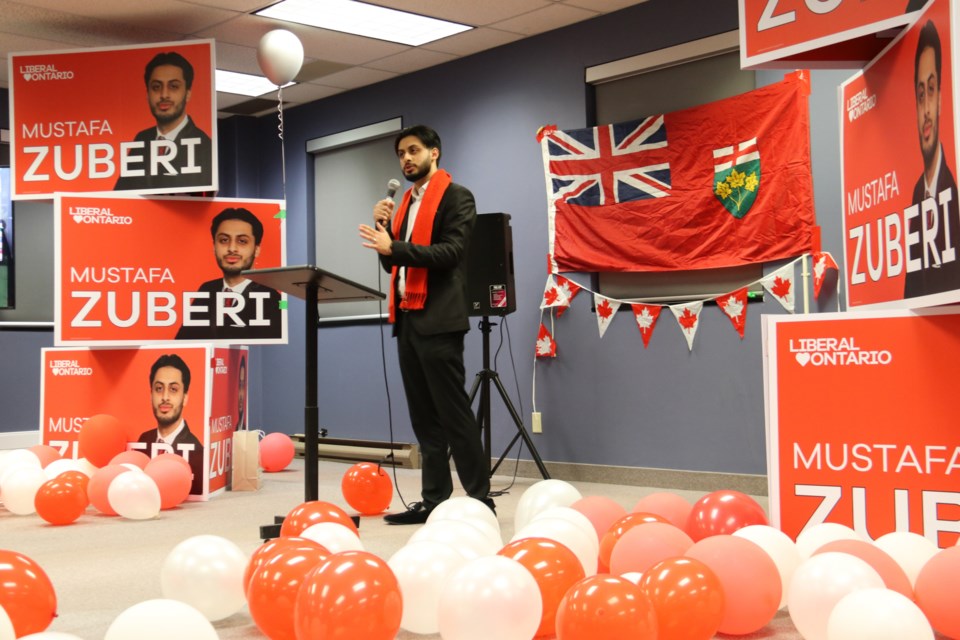 Liberal candidate Mustafa Zuberi addresses a crowd of supporters following his election loss on Thursday.