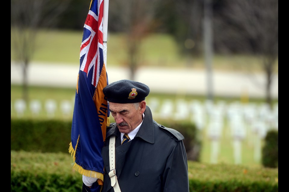 A member of the colour guard bows his head during the We Will Remember Them ceremony at the Wellington County Museum and Archives Monday, Nov. 6, 2017. Tony Saxon/GuelphToday