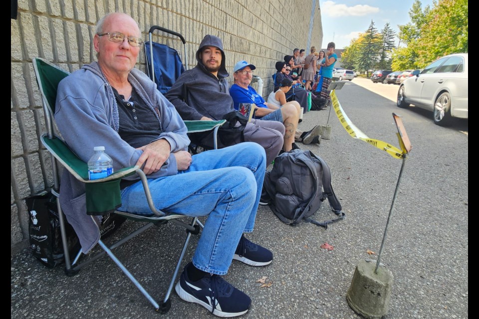 Kitchener resident John Bradshaw, left, was first in line for the 16th annual Big Book Sale.