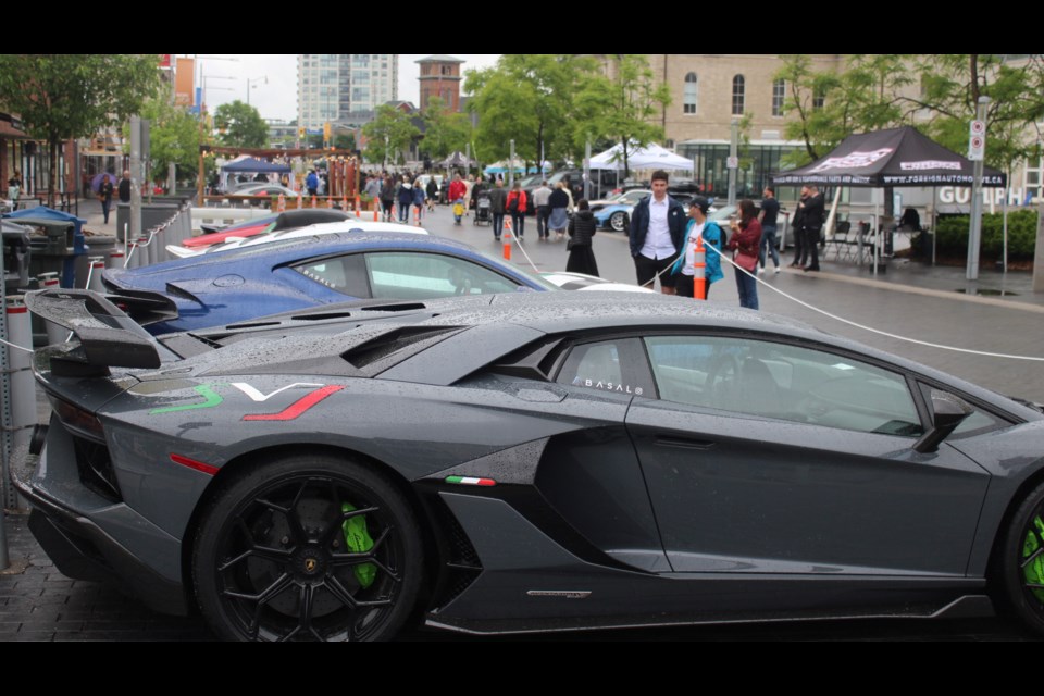 The annual Downtown Guelph Exotic Car Show was held Sunday afternoon through rainy conditions.