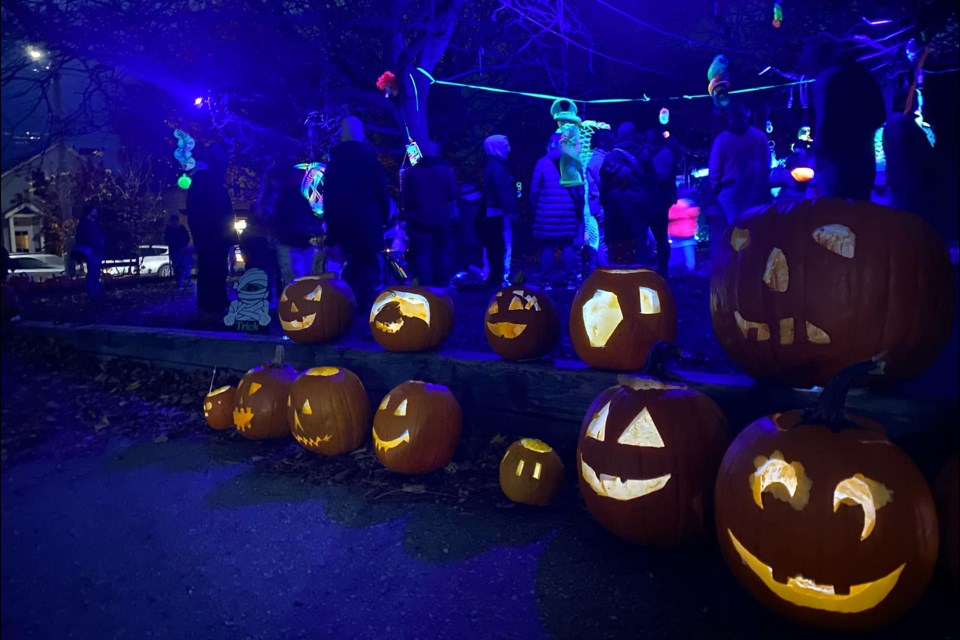 Halloween pumpkins get one last promenade at Tytler Public School Friday night.