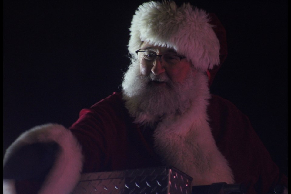 Santa Claus came riding in on a fire truck during the 2024 Guelph Community Santa Parade Saturday.