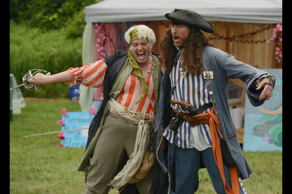 Pirates fight. Pirates hug. Pirates be pirates at the Ontario Pirate Festival Saturday at Marden Park. The event continues Sunday and Monday.