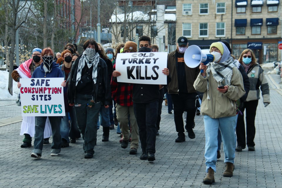 Protesters marched from city hall to St. George's Square for a moment of silence.