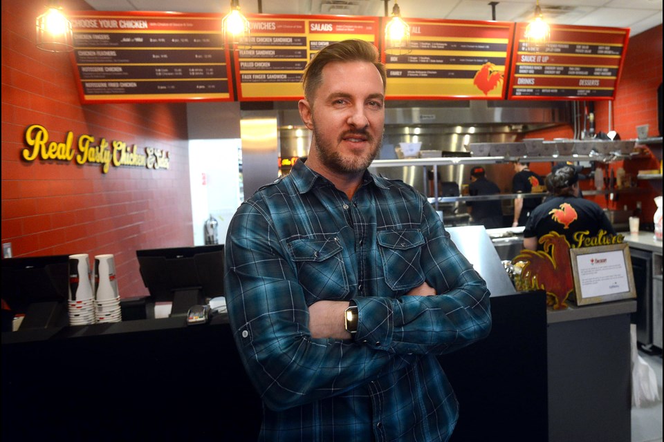 Brian Haase stands inside The Chickery on Stone Road. Tony Saxon/GuelphToday