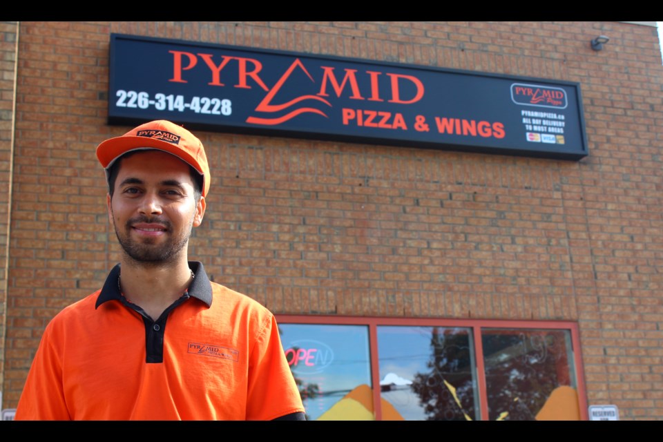 Pyramid Pizza & Wings owner Astle Kumar outside of his new business at 206 Speedvale Ave. W.