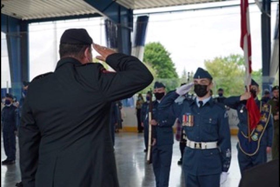 LCol Oritz-Sosa receives a General Salute from WO1 Whelan and all 121 Squadron.