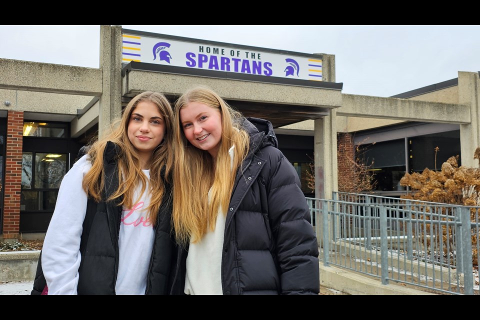 Elisa Napier, left, and Ellie Schlotzhauer, a pair of Grade 12 students at Centennial CVI held a period poverty drive at their school. Donations will be brought to Hope House this week.