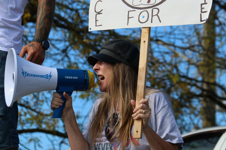 Family and friends of Nathaniel Schofield marched through downtown and rallied outside of the Ontario Court of Justice on Wyndham Street Sunday, pressing for answers surrounding his death. 