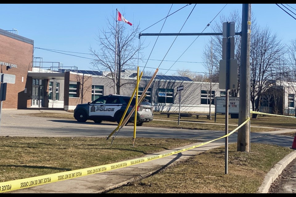 Police tape blocks access to Waverley Drive Public School on Friday morning following a threat at the school.