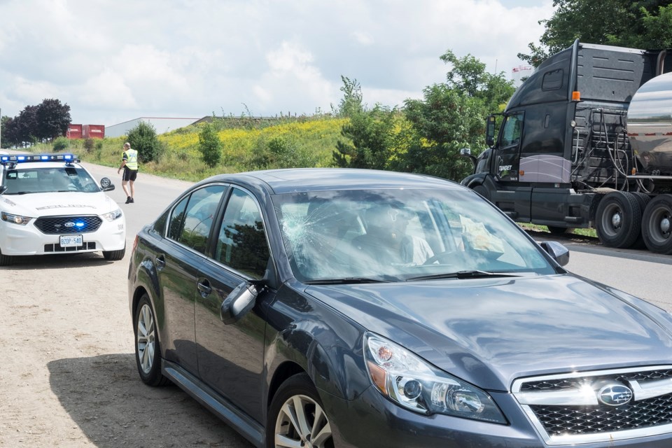 A smashed windshield and broken mirror seen on a car involved in a pedestrian collision on Massey Road near Imperial Road N Tuesday afternoon. Kenneth Armstrong/GuelphToday