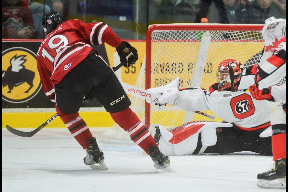 Isaac Ratcliffe fires home a goal past Ottawa 67's goaltender Michael DiPietro Sunday at the Sleeman Centre. Tony Saxon/GuelphToday