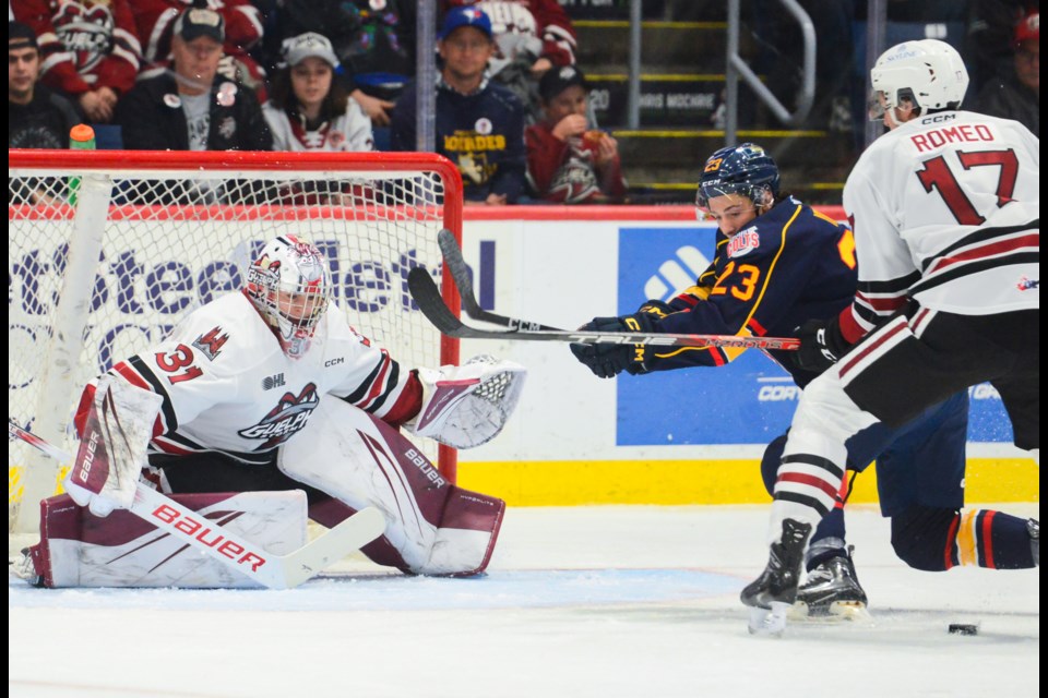 Guelph Storm goaltender Brayden Gillespie tracks the puck in front of his net.