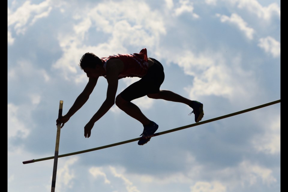 A competitor clears the bar at the Royal City Inferno Track and Field Festival Tuesday at Alumni Stadium, which featured athletes from around the province.