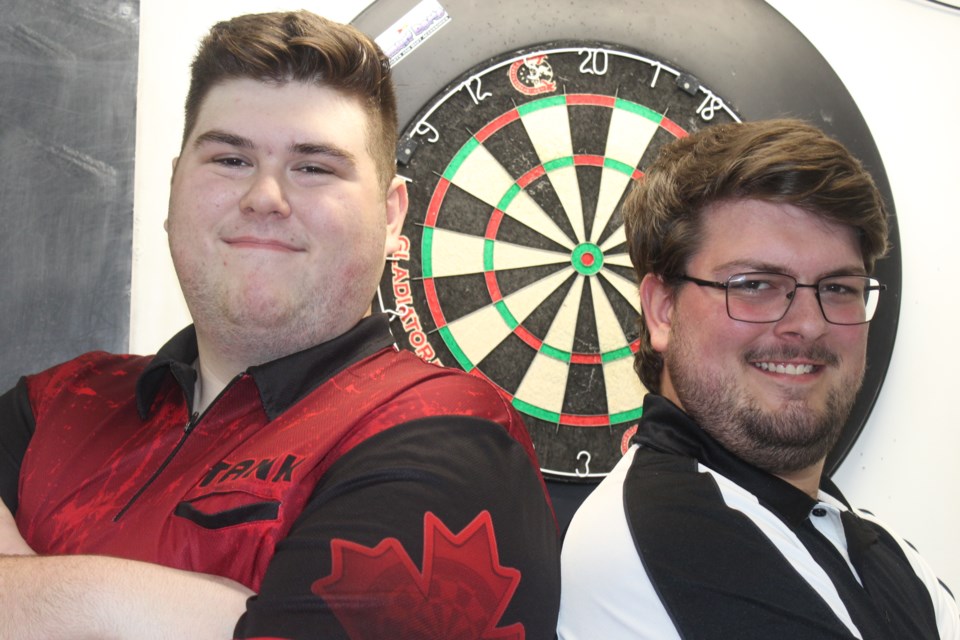 Nicholas Cripps, left, and Conor Harkness are heading to Hungary in October to compete at the WDF Masters darts tournament.