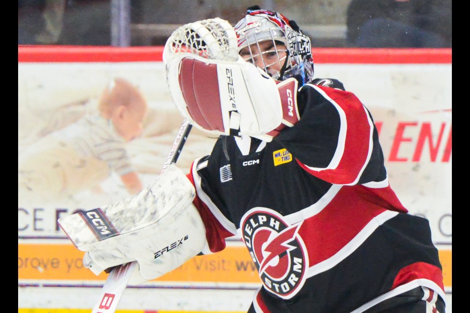 Guelph Storm goaltender Brayden Gillespie eyes the puck after making a glove save against the Windsor Spitfires Friday at the Sleeman Centre.