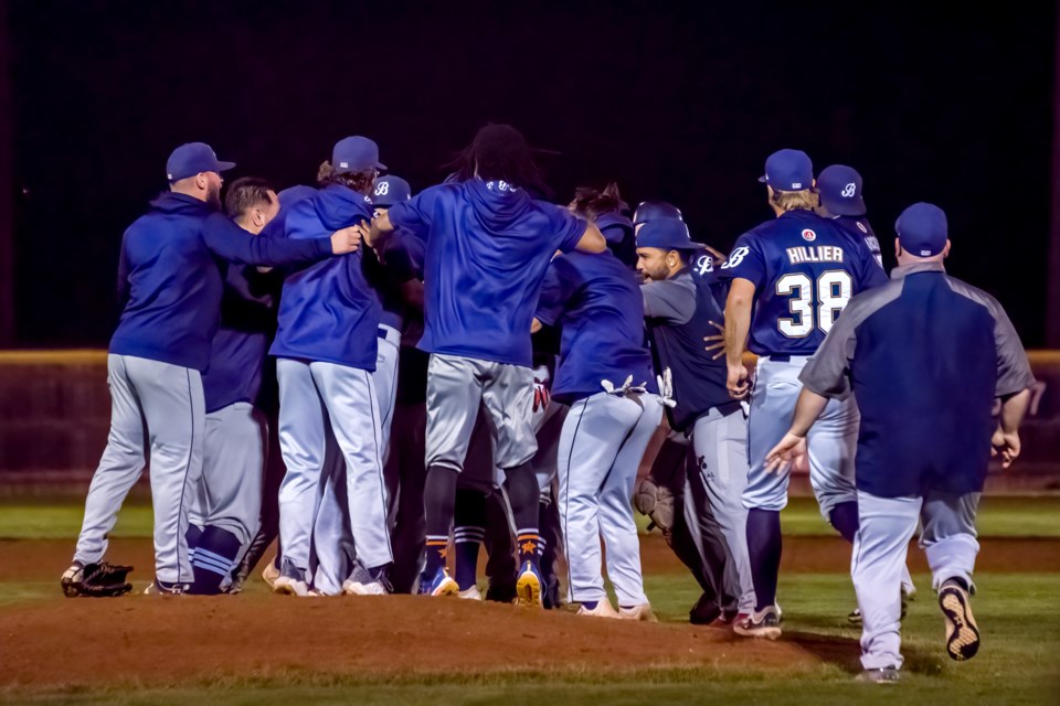 The Barrie Baycats celebrate on the mound at Hastings Stadium following the final out of Game 4 of the Intercounty Baseball League's best-of-seven championship series. The Baycats defeated the Guelph Royals 6-2 Saturday to finish a sweep of the final.