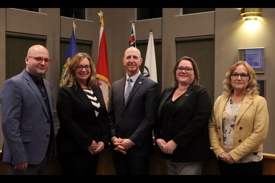 From left to right: Coun. Michael Martin, Lori Woodham, Mayor Gregg Davidson, Coun. Amanda Reid and Coun. Marlene Ottens