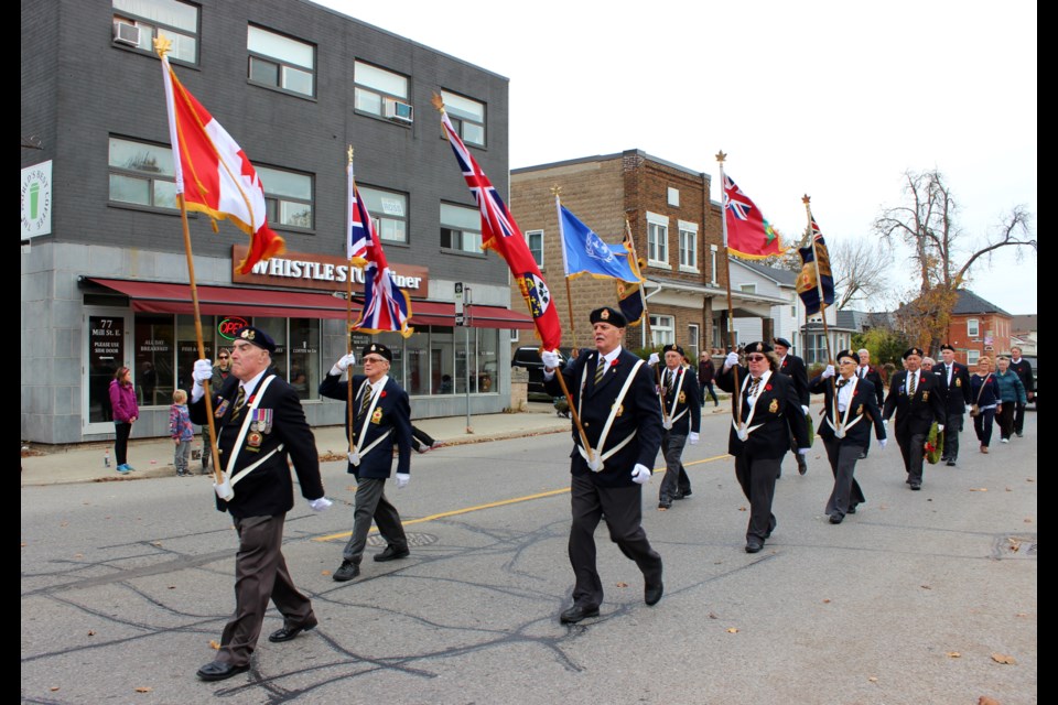 Members of the Acton branch of the Royal Canadian Legion march in the parade.