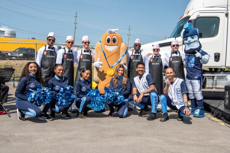 The Freshouse crew with members of the Argonaut cheerleaders and their respective mascots at the unveiling of the world's biggest smoked sausage.