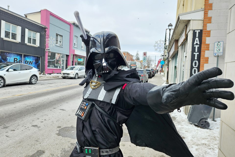 You were not seeing things. That was Darth Vader walking the streets of Acton. Matthew Pickles dons the Star Wars costume occasionally, hoping to brighten people's day.