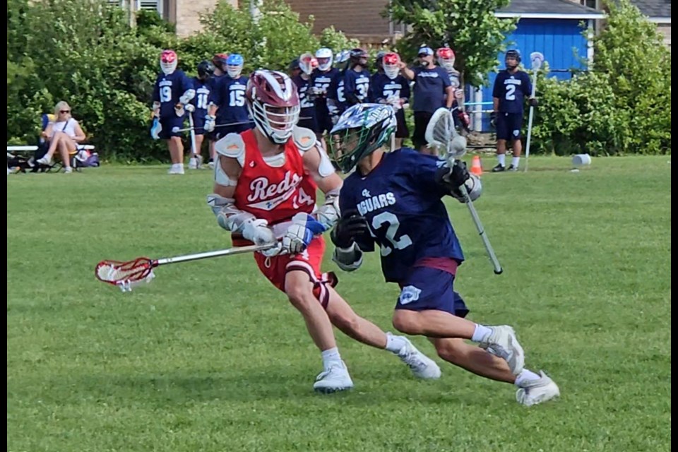 Zak Marshall of the Christ the King Jaguars avoids a Denis Morris opponent Thursday at the OFSAA field lacrosse championship at the Gellert Community Centre. Marshall scored three times to give the Jaguars a 6-3 lead but Denis Morris rallied for a 7-6 win to claim the bronze medal.