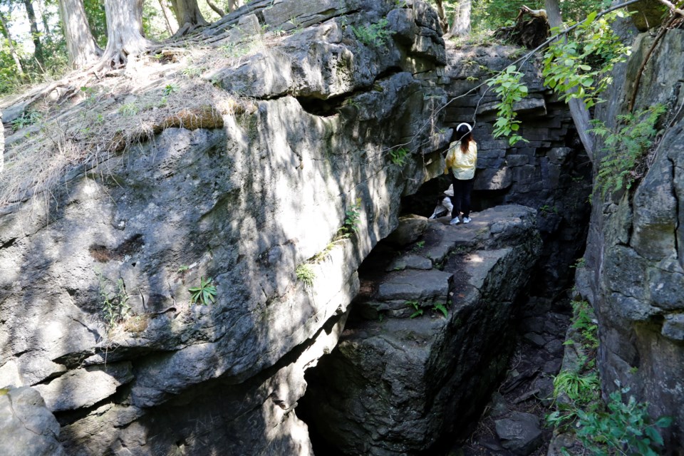 We started on the trail at the Limehouse Conservation Area, where tourists like these delight in the unique rock fissures. 