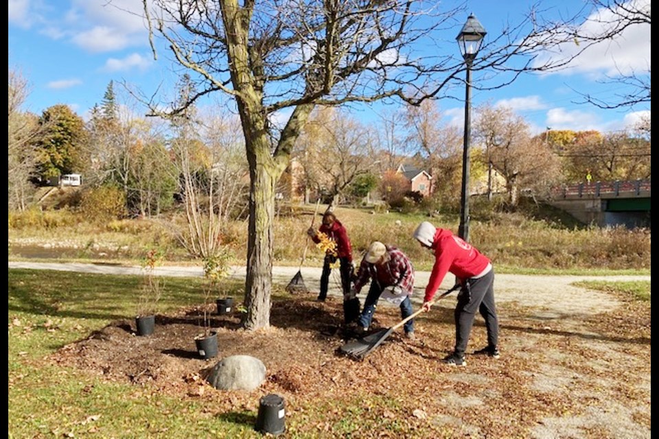 GWCA volunteers adding plants to Shelagh Law Parkette. 