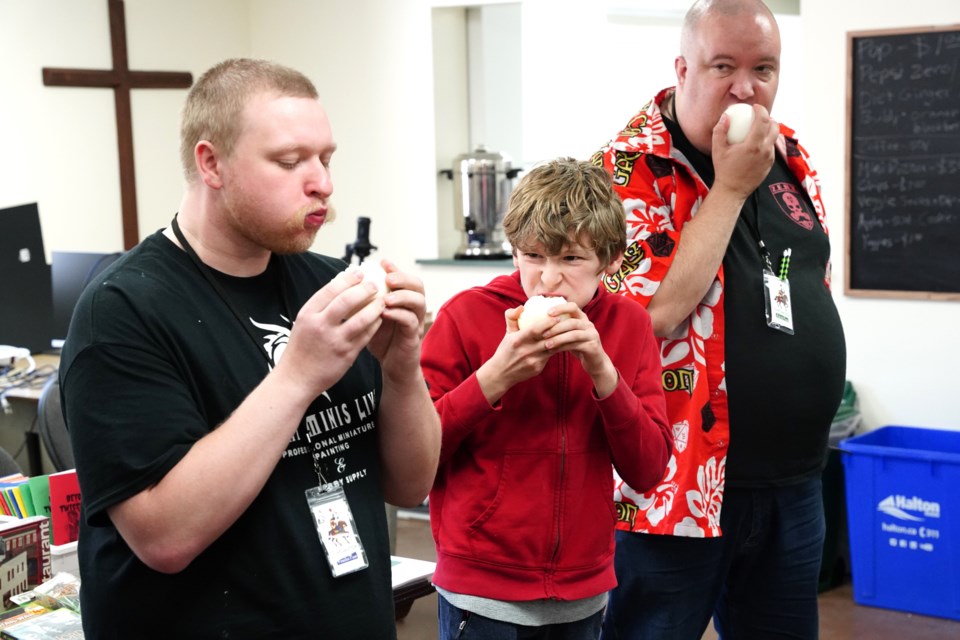 James Orear, 12, eyes the competition to defend his title at the Bob Johnny Onion Eating Contest.