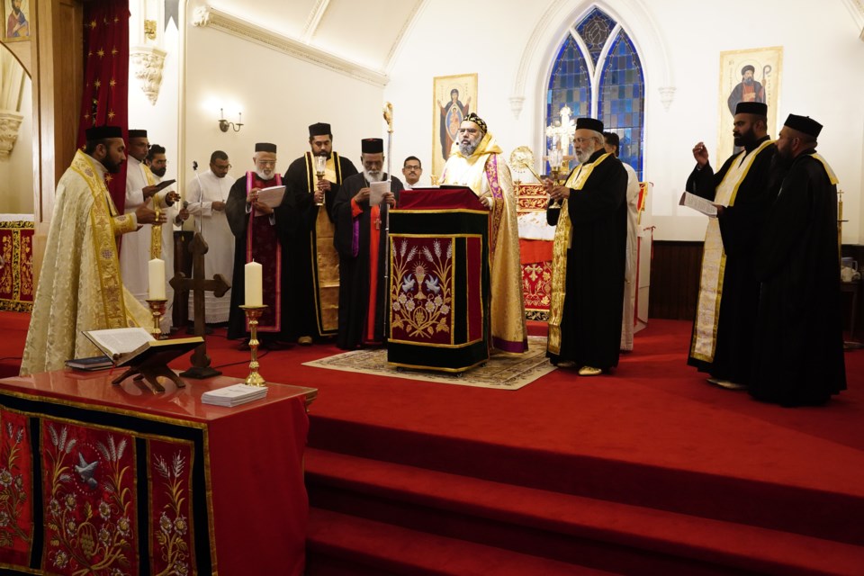 Bishop Zachariah Mar Nicholovos Metropolitan leads the consecration ceremony.