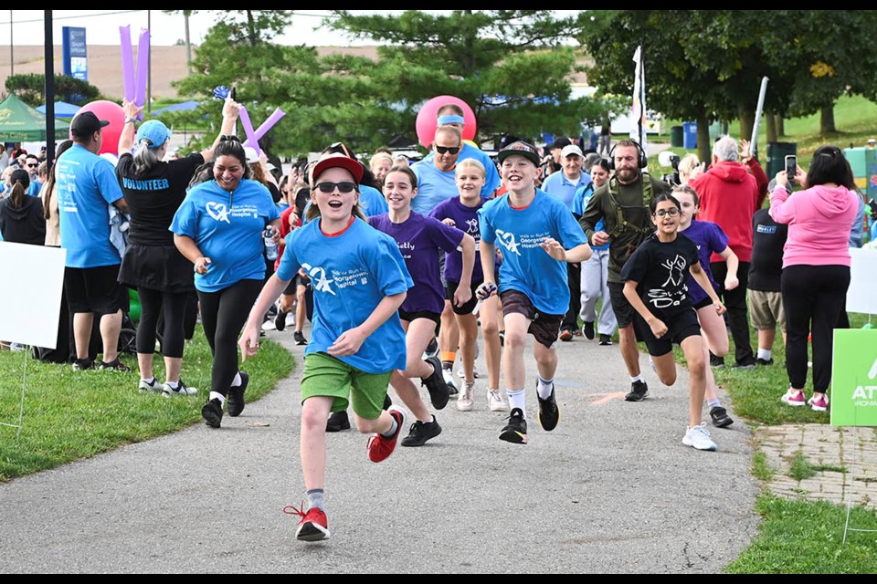 Participants hit the course for the five-km run at the 16th annual Walk or Run for Georgetown Hospital.