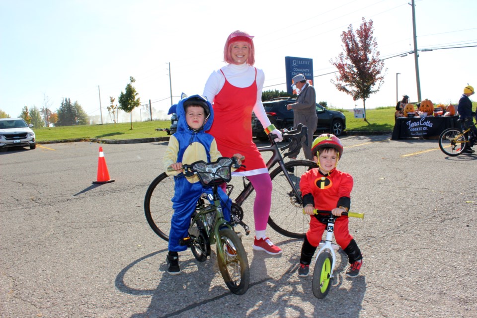 (From left) Grayson, Danielle and Jackson Giliauskas get into the spirit of the season at Bike It Halton Hills' inaugural Halloween costume bike parade, held Saturday afternoon at Georgetown's Gellert Community Park.