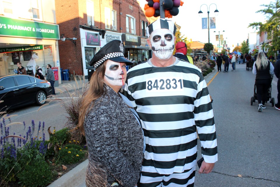 Agnes Klich and Thomas Orlwicz get into the creepy spirit at Masquerade on Main.