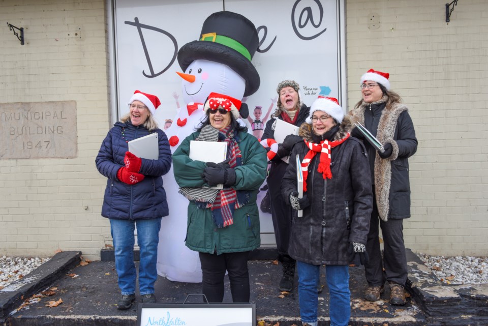 20241201georgetownholidaymarketcarollers