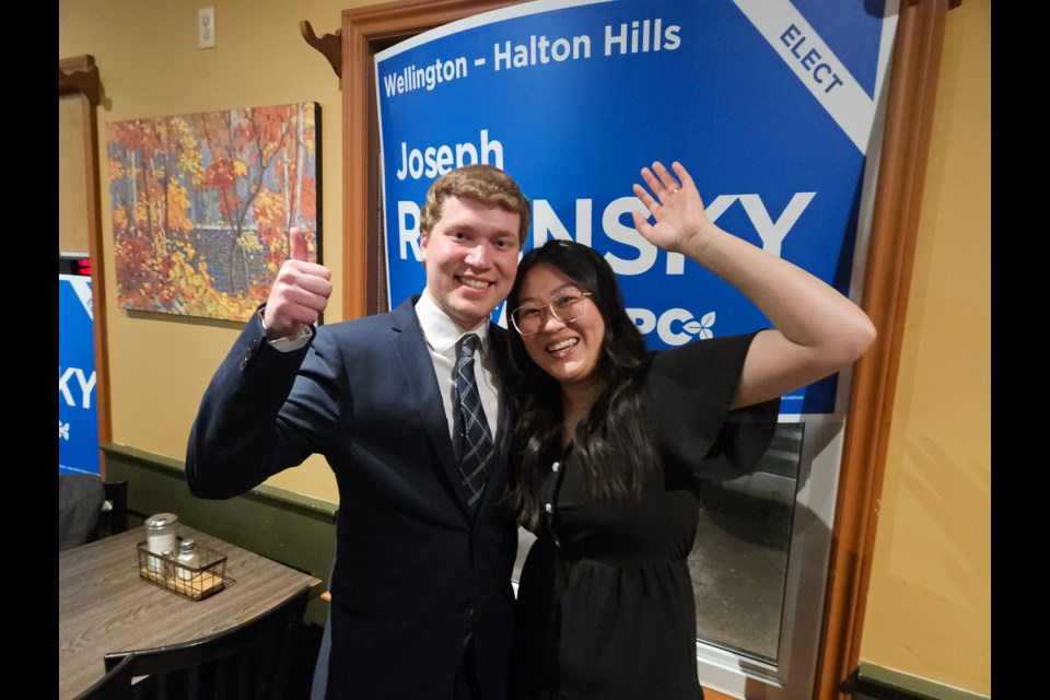 Joseph Racinsky celebrates his election win with wife Mikayla.