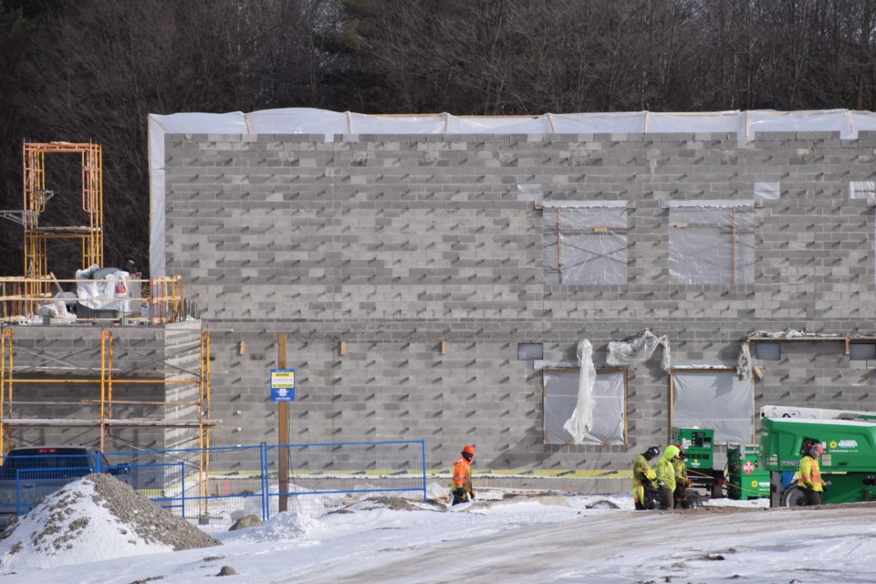 Construction is well underway on a two-storey, yet-to-be-named facility southeast of the Killarney Beach Road and 20th Sideroad intersection in Lefroy.