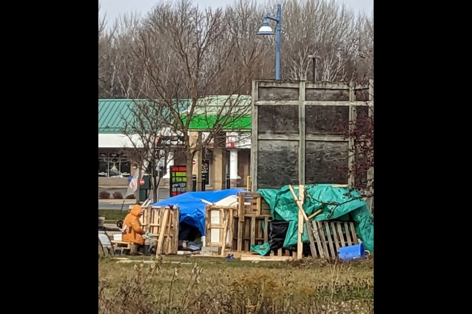 An unsheltered woman who was living in a makeshift structure near Innisfil Beach Road has been removed from the property, along with her contents. This photo of the site was taken Dec. 1. 