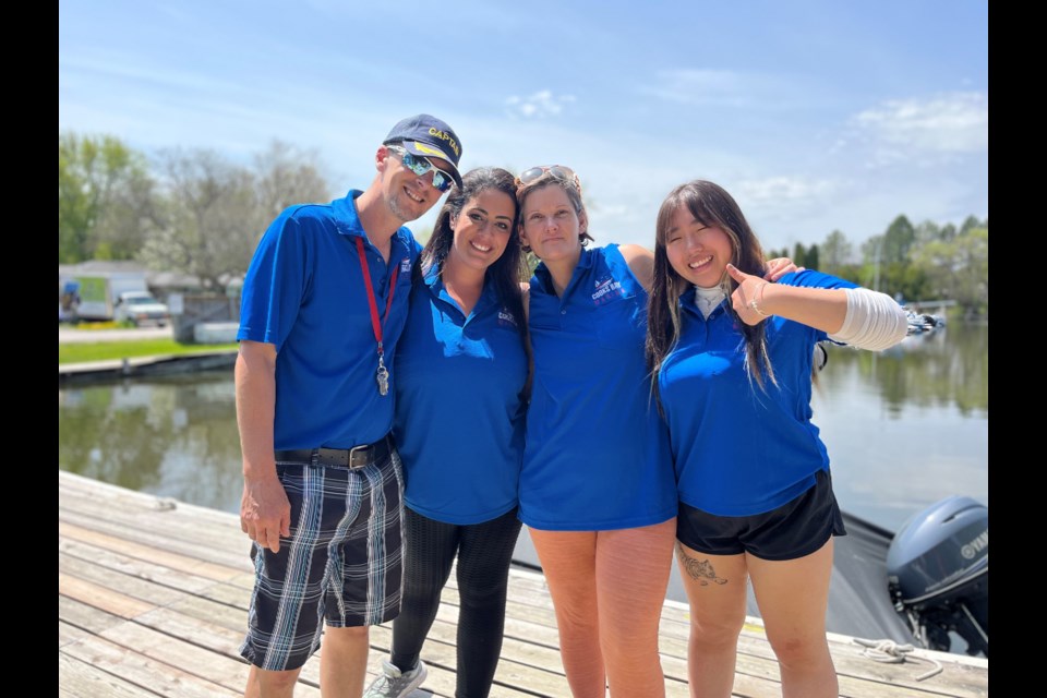 Cooks Bay Marina held its Welcome Summer 2023 event on Saturday. Mariah Giesen (second from left) is shown with Cooks Bay Marina staff.