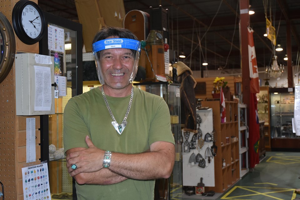 Antiques expert David Downie, returning to work in a face shield at Roadshow Antiques North. Miriam King/Innisfil Today