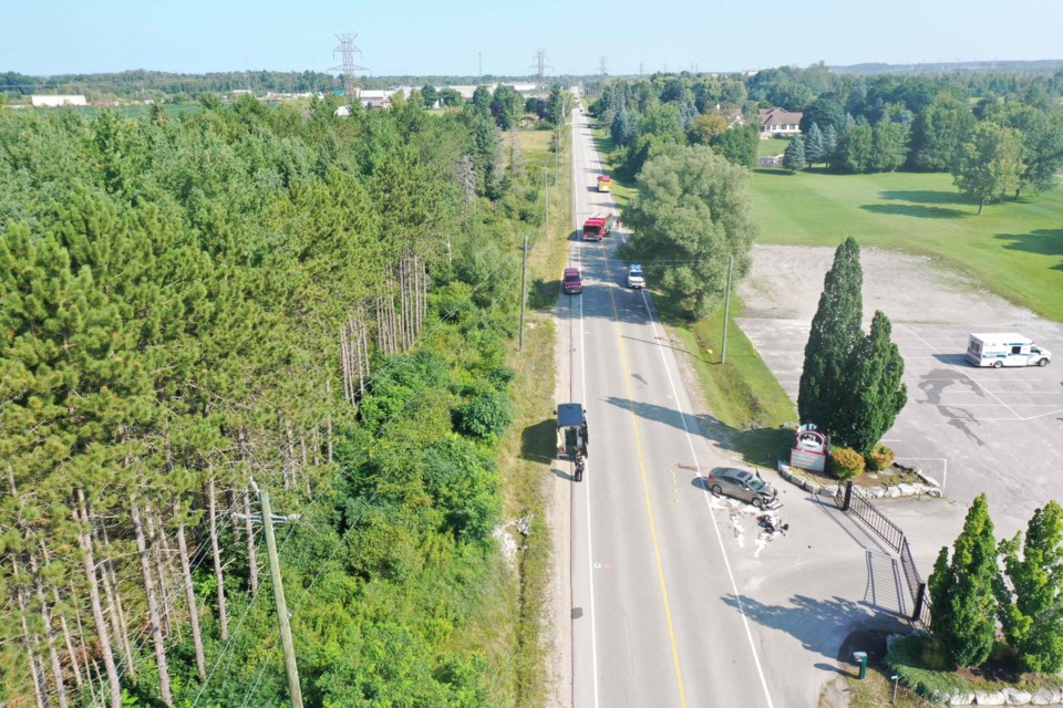 A two-vehicle collision Thursday on County Road 56 in Essa Township sent a motorcyclist to hospital with serious injuries.