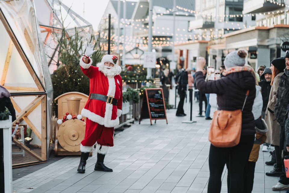 A 40-foot festive tree serves as a beacon for the holidays at Friday Harbour in Innisfil, inviting community members to enter a winter wonderland, including the annual Holiday Market, which runs until Dec. 29.