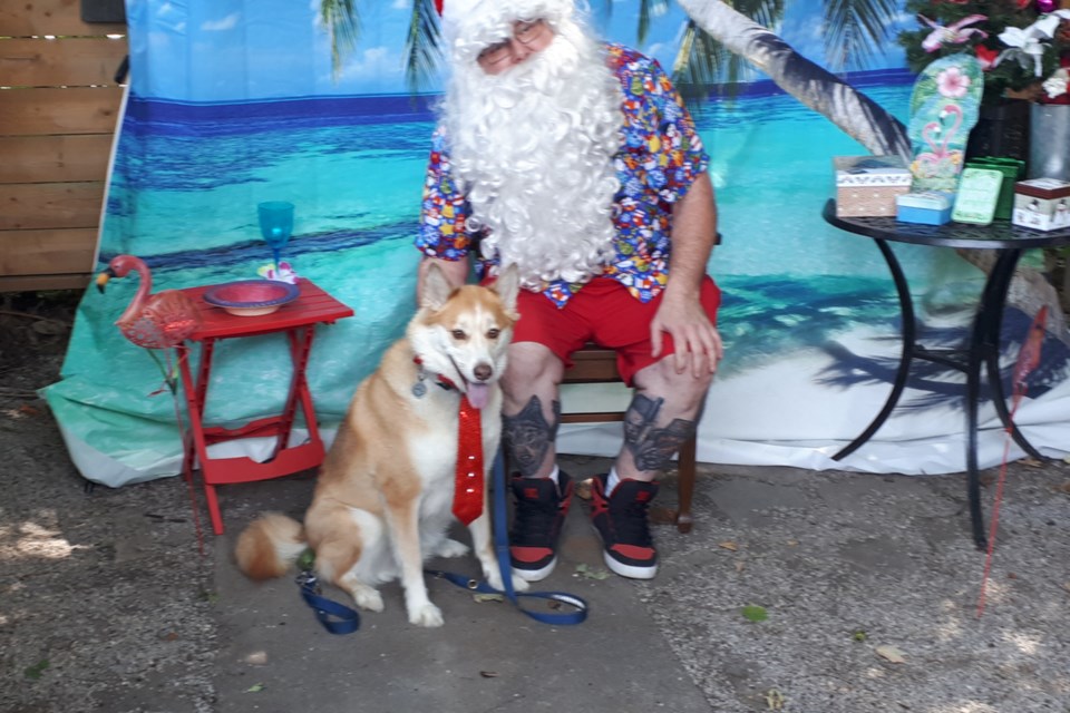 Santa with Dakota the dog.