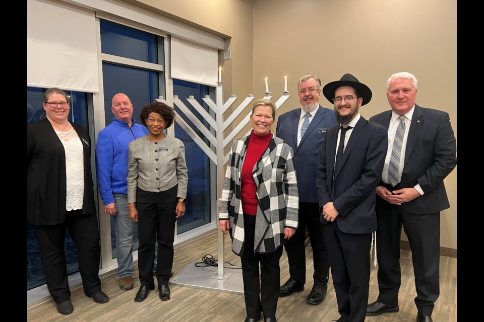 From left to right: Town Councillors Jennifer Richardson, Robert Saunders, Grace Constantine, Mayor Lynn Dollin, Deputy Mayor Kenneth Fowler, Rabbi Zevi Kaplan, Barrie-Innisfil MP John Brassard. 