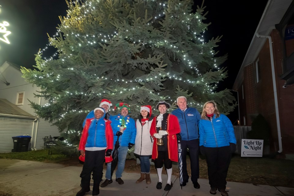 Posing at the tree alight from left, Councillor Grace Constantine, Deputy Mayor Ken Fowler, Councillor Fred Drodge, Chamber representative, Cryer Sean Derraugh, MP John Brassard and Mayor Lynn Dollin