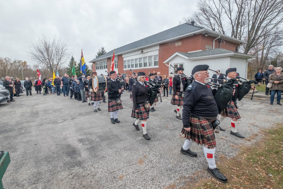 Remembrance Belle Ewart
The Innisfil Pipes & Drums lead off the parade from the parking lot to the Cenotaph.