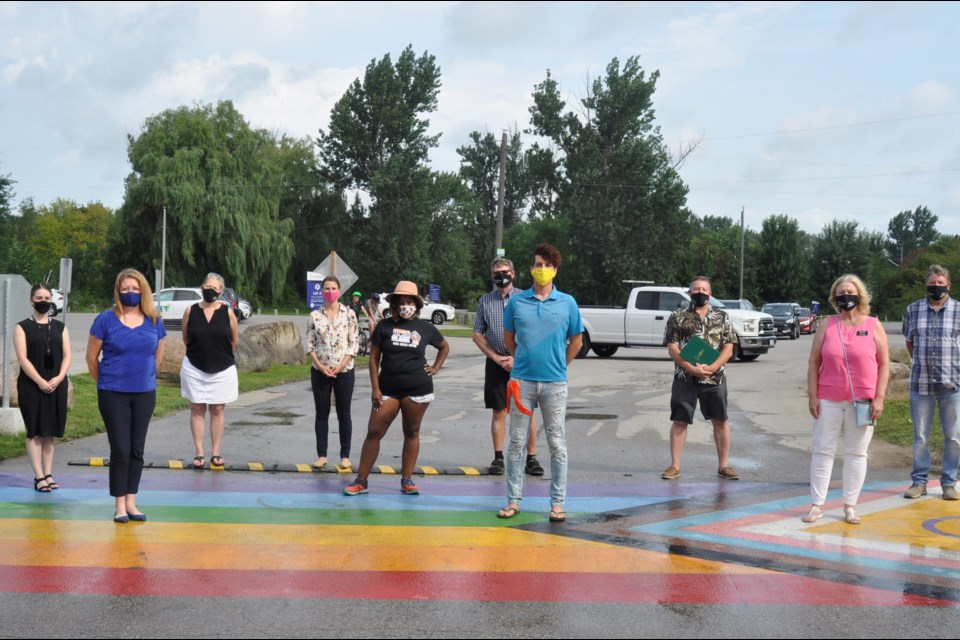 Innisfil’s Mayor Lynn Dollin, joined by Deputy Mayor Dan Davidson, Coun. Bill Ven Berkel, Coun. Alex Waters, and Coun. Donna Orsatti - New inclusive progress Crosswalk at Innisfil Beach. 