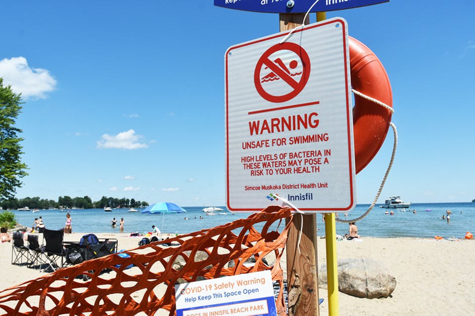 Swim Advisory sign posted at Beach 2, at Innisfil Beach Park North. Miriam King/Innisfil Today